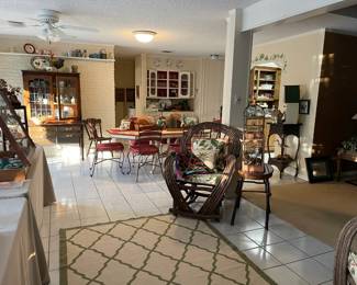 Looking down the sun room into the dining kitchen area
