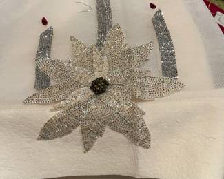 The beautiful sequined piece on the table cloth