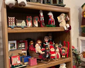 Book shelf, ornaments, Santa, Foxes dressed for Christmas, House