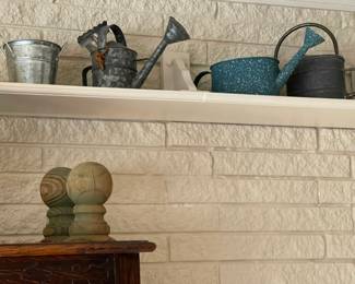 Watering cans, wood pieces