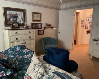 Vintage French Provincial chest of drawers, upholstered blue swivel chair, King quilt and pillows