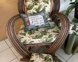 A close look at one of the twig chairs, twig foot stool both items have cushions