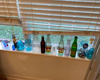 Fun bottle and glass collection.