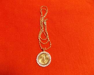 Gold coin with 14K bezel