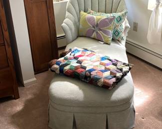 Quilts pillows. Chaise. Storage unit for CDs.