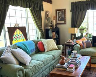 MCM coffee tables, pillows thrown, loads of books, collection of Buddha's. Stained glass, lamps, art, smalls.Sofa's NFS. 