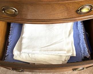The drawers were full of linens which will be on a tables in DR. 