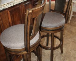 two swivel barstools