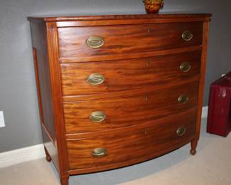 beautiful antique four-drawer, bow-front chest