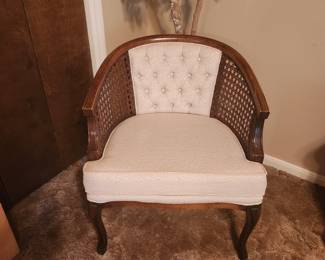 Two of two barrel back chairs.