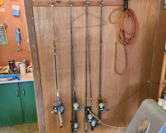 Garage - Fishing rods - extension cord with attached light