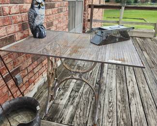 Unique table with sewing machine base