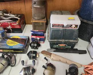 Garage - tackle box, fishing reels, knife 