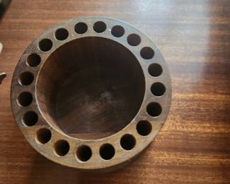 Canister with individual holes for cigarettes...