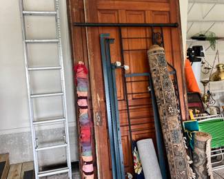 The doors in the background are sliding barn door style doors. They are gorgeous and ginormous! They would be stunning in the right spot! You cannot miss this sale if you have been looking for this type of door!!