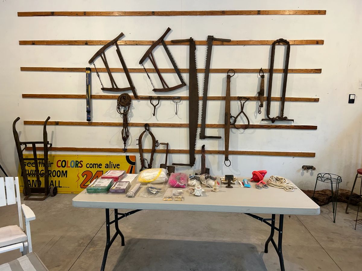 Vintage farm equipment, saws, ice hooks, boat items