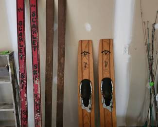 2 pair of vintage snow skis.  Pair of trick water skis.