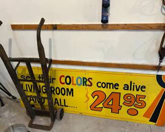 Vintage hand truck and sign