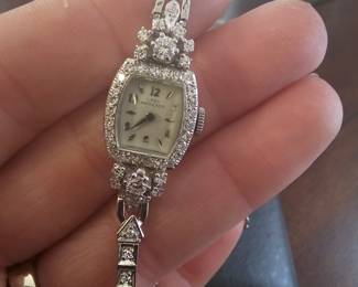 Hamilton ladies white gold and diamond watch encrusted in diamonds all the way around