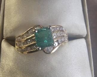 Columbian Emerald in 14 jt gold and diamonds 