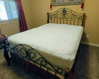 Black iron queen bed