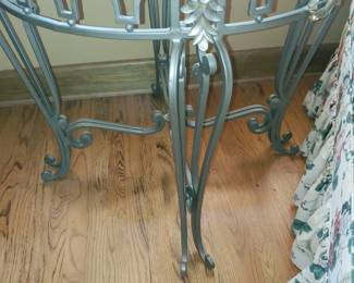 Glass, stone, and metal table