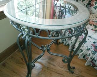 Glass, stone, and metal table