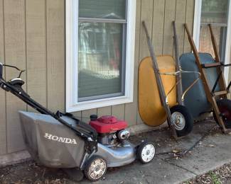 Lawnmower for parts and wheelbarrows