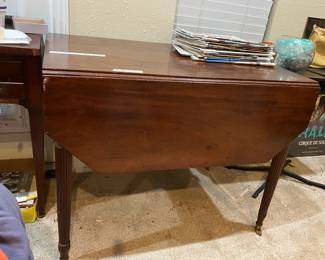 Table. Both sides fold down. Drawer in one end 