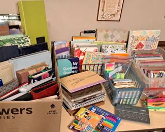 2 tables of scrapebooking supplies