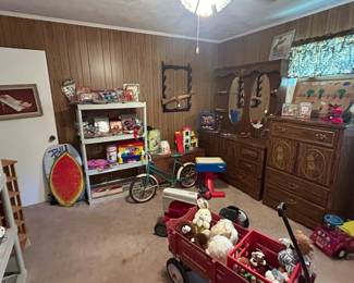 First bedroom on the left lots of toys furniture