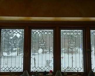 Antique leaded glass window inserts. Bevels, and fleur de lis focal point design incorporating classic German Antique privacy glass background. Excellent condition. No known chips, cracks or flaws detected. Various sizes available. Casement window Measurements: 34" x 18" Half Door Measurements: 35 1/4" X 21 1/4" Double Hung Measurements: Each top and bottom panel measures 27" x 23".