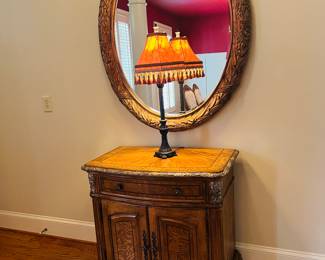 Carved wood with gilt accents accent table