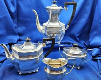 Four Piece Coffee and Tea Service by I.F.S Sheffield, England - Silver Plate with Black Handles