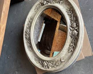Oval antiqued mirrors 