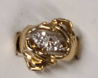 Custom made ring. 14K hands holding Diamonds