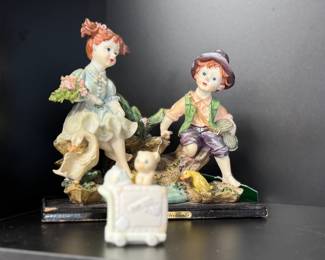 Porcelain figurine from the "PJ Collection" depicts a charming scene with two children and ducks.