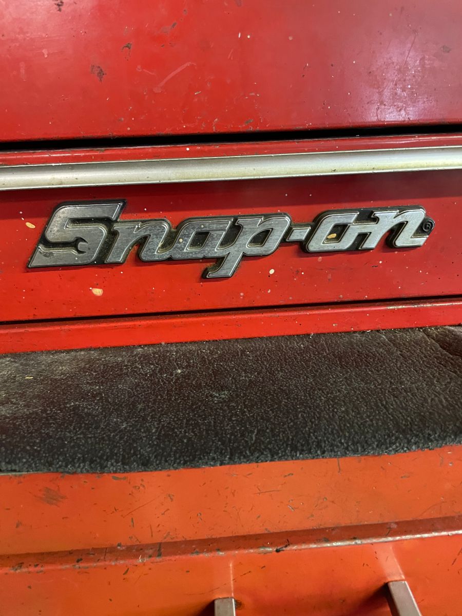 Many Snap-on tools and cabinets.
