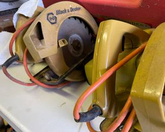 Several electric Black and Decker circular hand saws