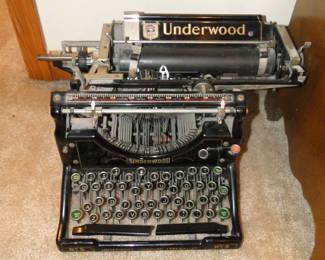 Underwood, vintage typewriter. Could you imagine typing really fast and having one of your fingers slip off the keys, man that would smart!