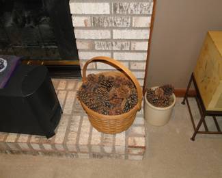Basket and crock filled with pine cones, for decorative purposes, or burn the lot in the fireplace