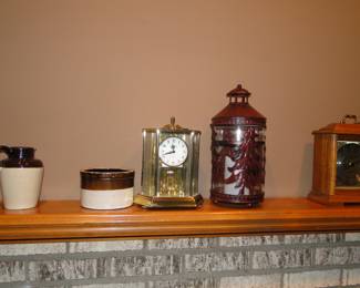 Clocks', and lantern, more pottery jugs and bowls