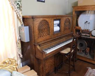 Wurlitizer Mechanial Player Piano and boxes of accessories  