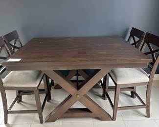 Collin’s 48” x 60” dining table butterfly leaf and 6 chairs. Brand new. 