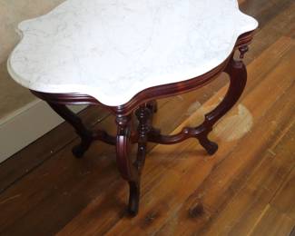 Solid marble table top.  