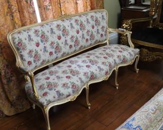 French Prevential style sofa in gold and pink rose fabric.