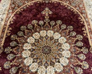 8 x 12 Persian hand-loomed rug with gold, burgundy, blue colors. $1900