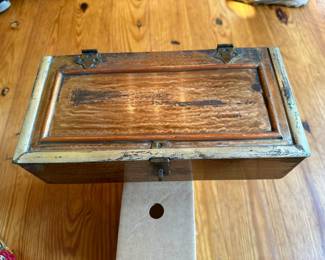 Copper box that holds gun