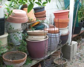Plants, pots and yard art. 