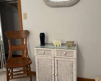 wicker cabinet/dresser, wicker framed mirror, and side chair